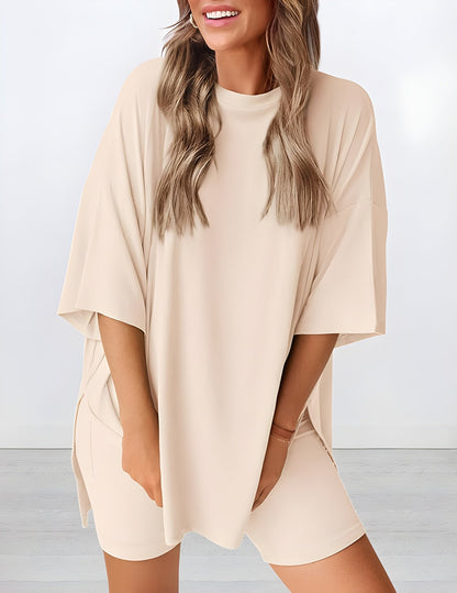 Angled view of lightweight two piece lounge set in beige – breathable oversized t-shirt and shorts for women