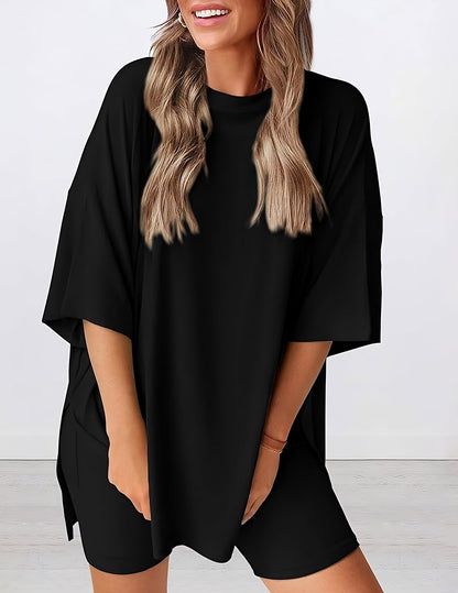 Angled view of lightweight two piece lounge set in black – breathable oversized t-shirt and shorts for women