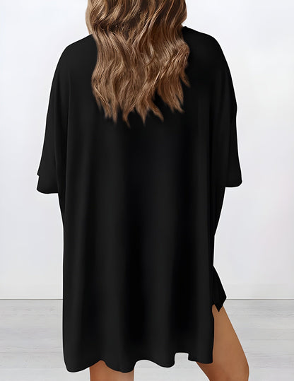 Back view of buttery soft loungewear set in black – oversized top and shorts for casual comfort