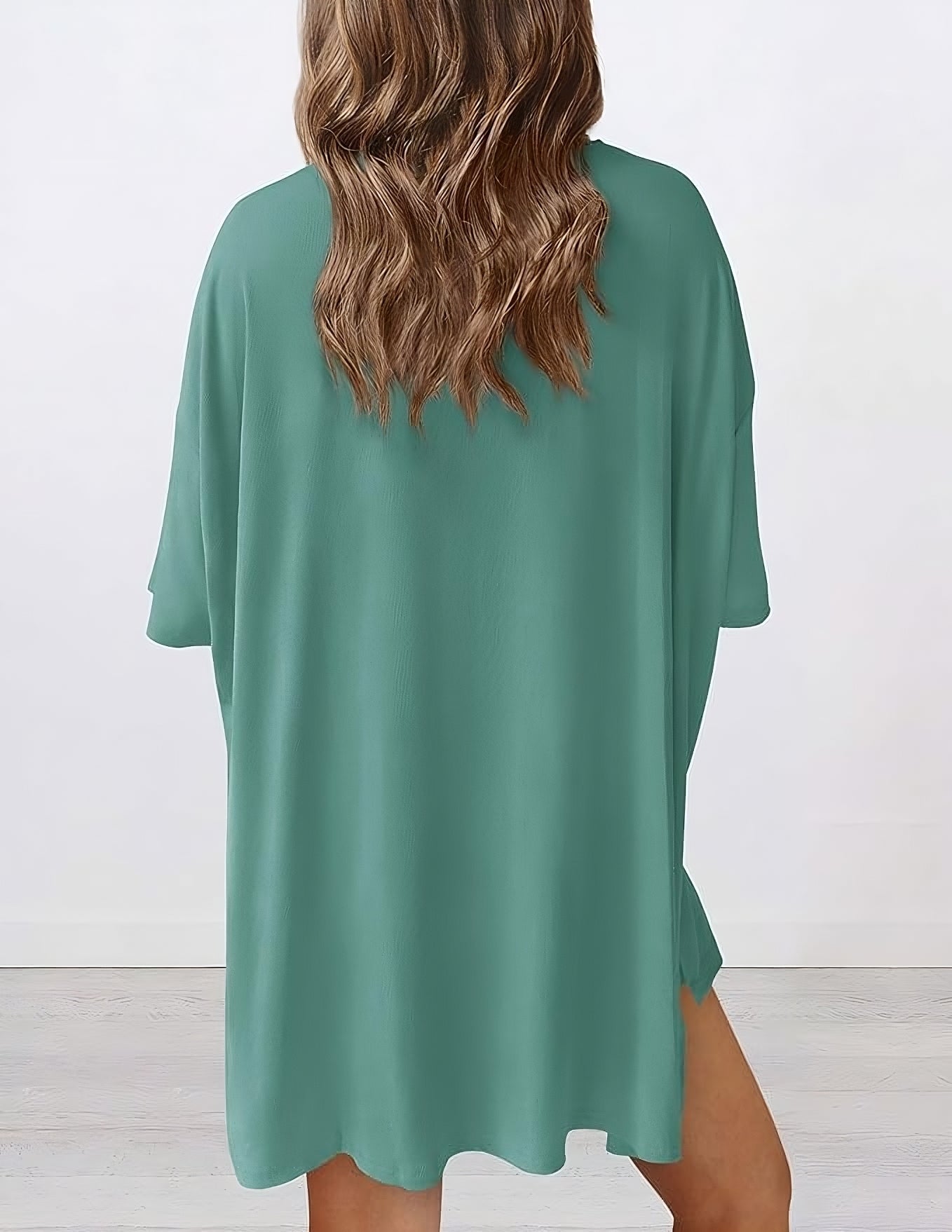 Back view of buttery soft loungewear set in fruit green – oversized top and shorts for casual comfort