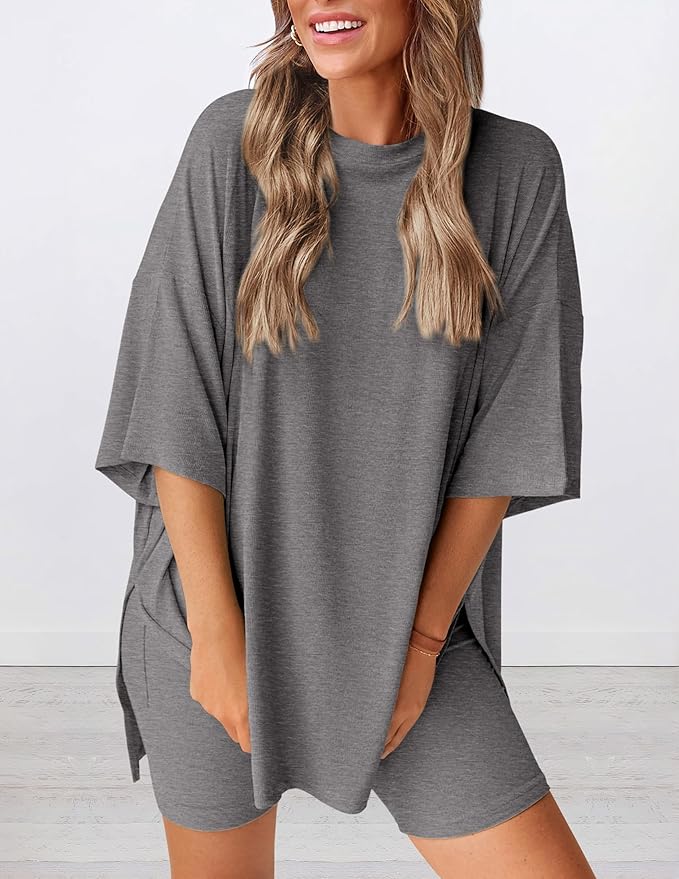 Angled view of lightweight two piece lounge set in gray – breathable oversized t-shirt and shorts for women