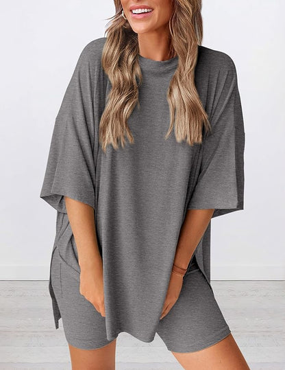 Angled view of lightweight two piece lounge set in gray – breathable oversized t-shirt and shorts for women
