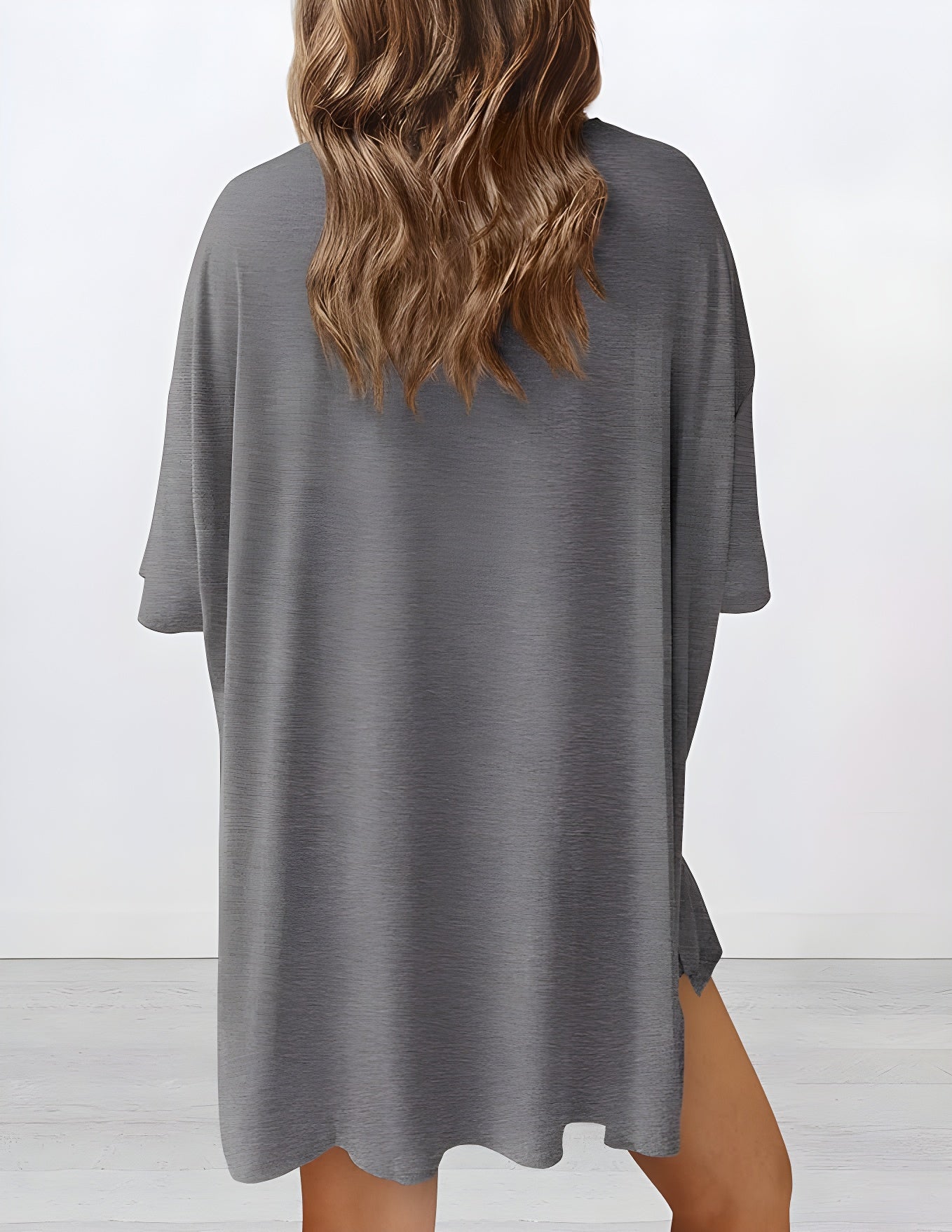 Back view of buttery soft loungewear set in gray – oversized top and shorts for casual comfort
