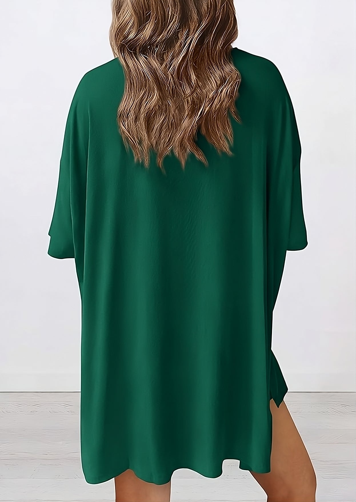 Back view of buttery soft loungewear set in green – oversized top and shorts for casual comfort