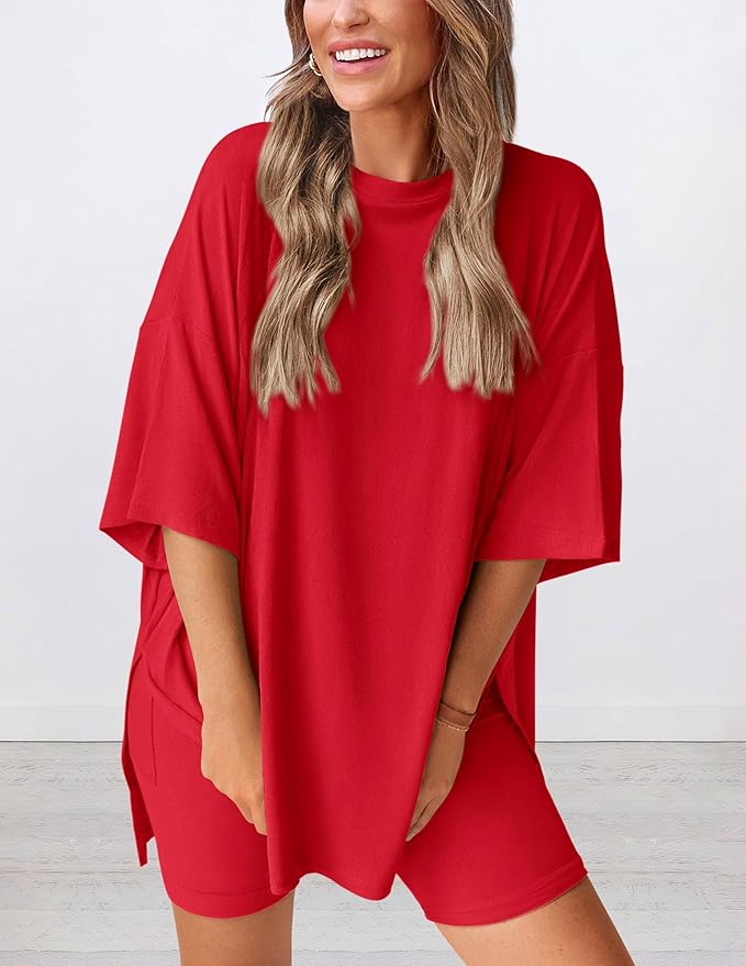 Angled view of lightweight two piece lounge set in red – breathable oversized t-shirt and shorts for women