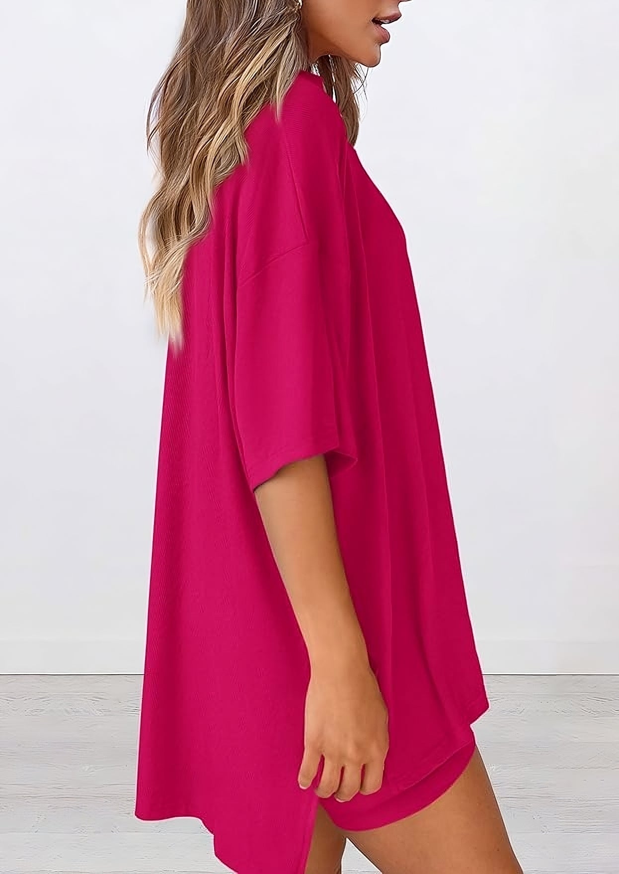  Side view of women’s summer loungewear set in rose red – oversized relaxed fit two piece with t-shirt and shorts