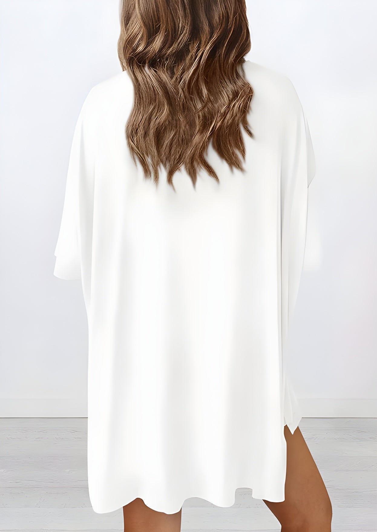 Back view of buttery soft loungewear set in white – oversized top and shorts for casual comfort